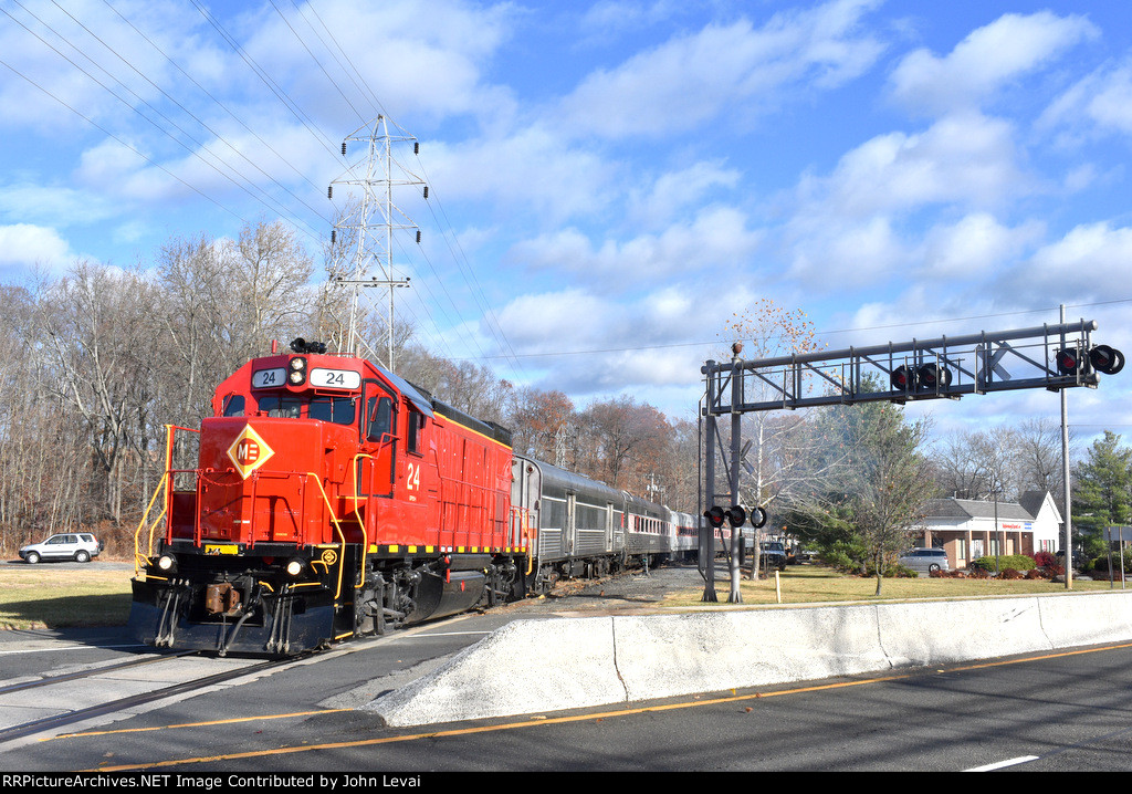 M&E GP15-1 # 24 is the leader on the 1:10 out of Whippany as it crosses Rt. 10 just west of the museum